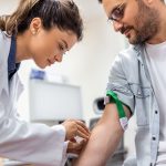 Comprehensive metabolic and cardiovascular blood panel results being reviewed by a consultant endocrinologist